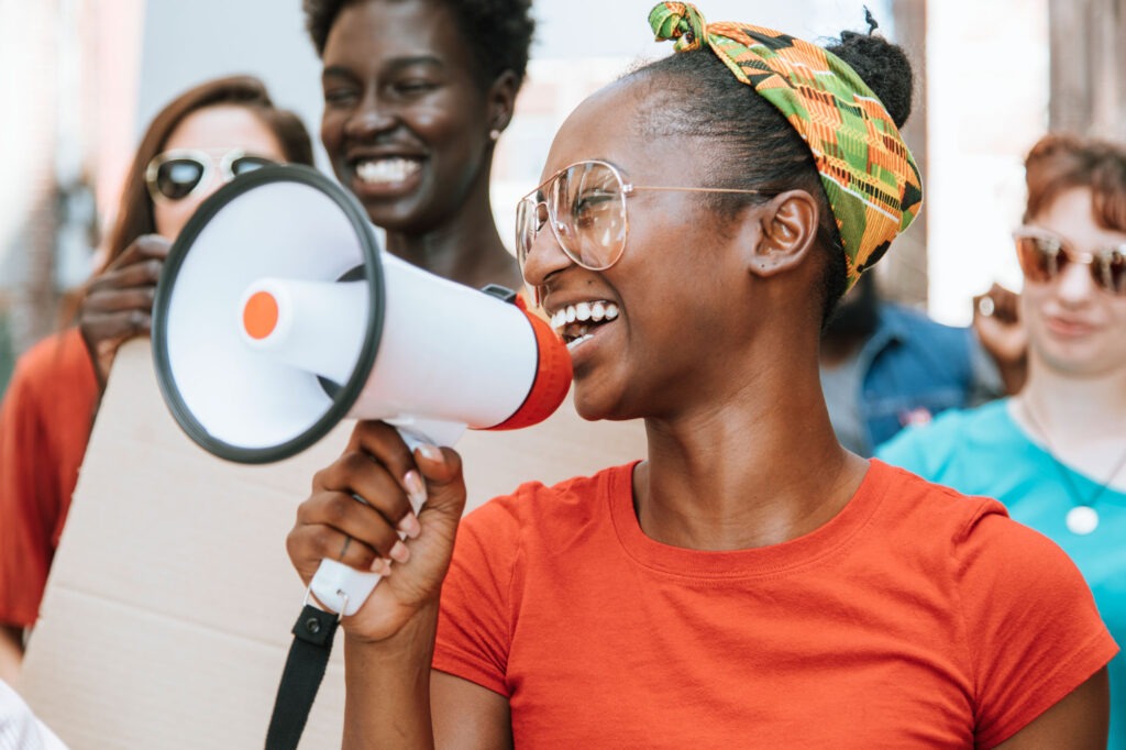 woman with a megaphone at a rally