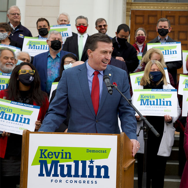 Kevin Mullin Behind Podium Speaks to Crowd