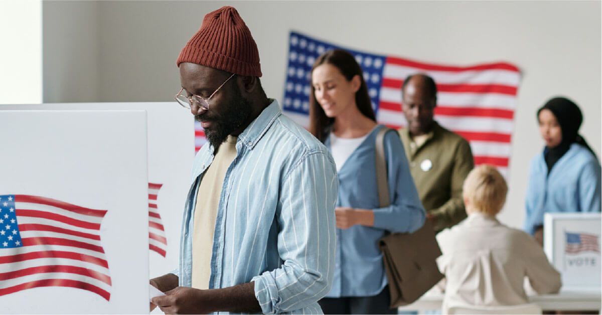 Voters voting in booths on Election Day