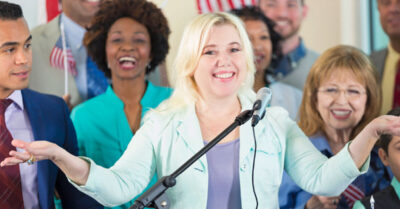 A candidate hosting an in-person campaign fundraiser, one of the most common political fundraising ideas.