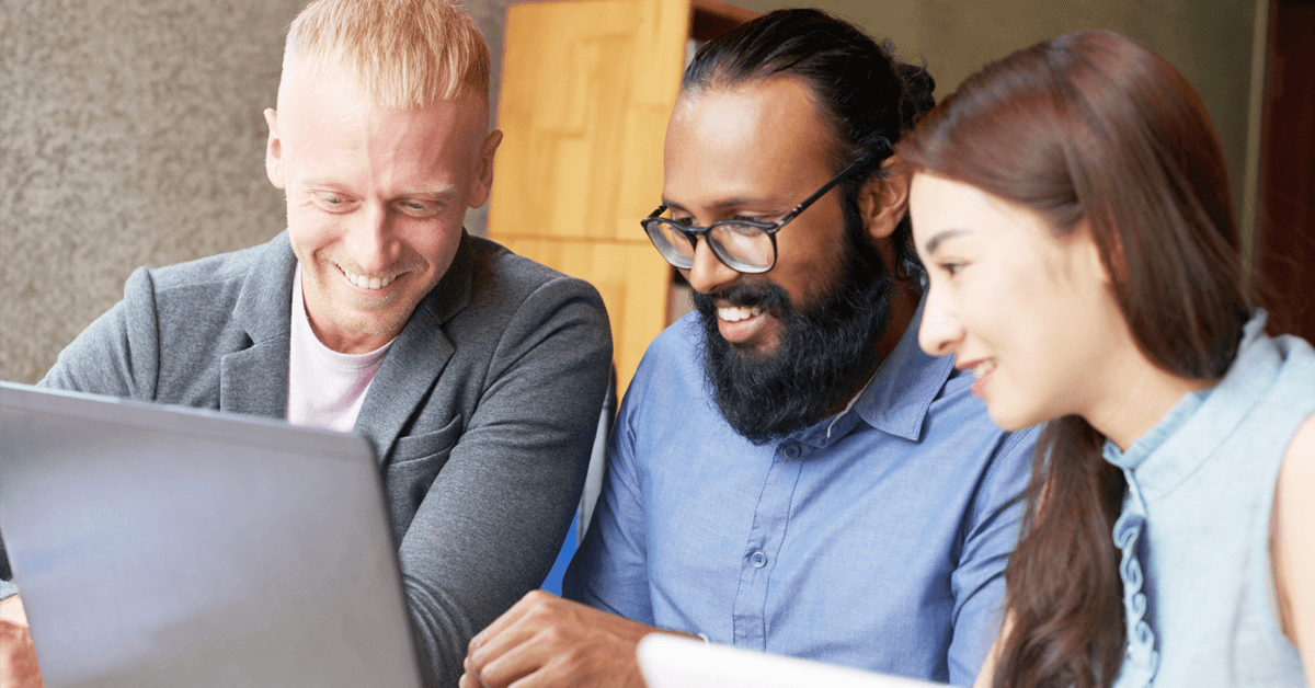 Three staffers evaluating political campaign tools.