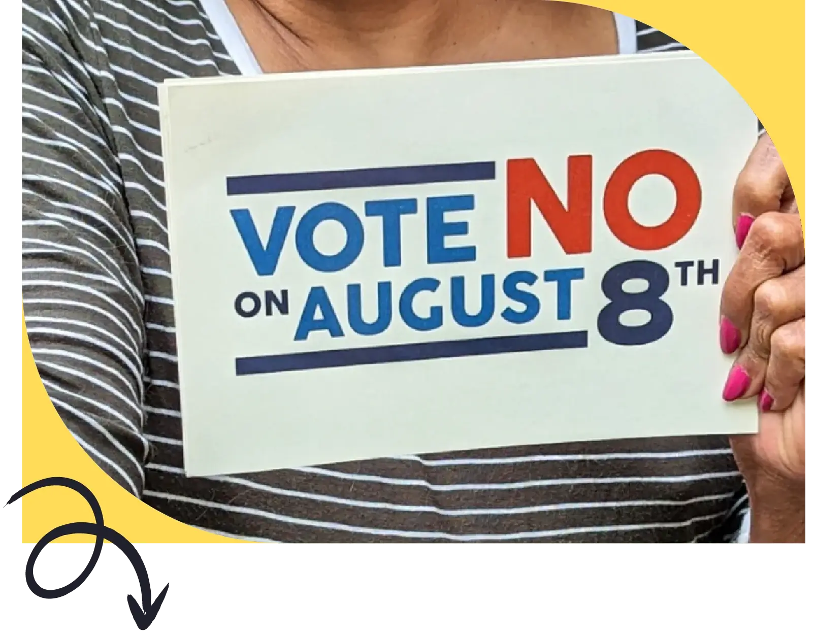 person-at-rally-holds-a-vote-no-on-august-8th-sign-against-issue-1-in-ohio-special-election-2023 Person at rally holds a vote no on August 8th sign against issue 1 in Ohio special election 2023