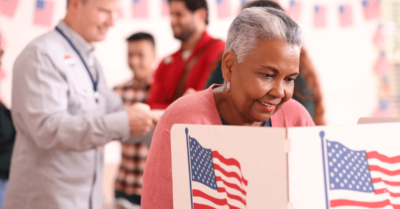 A woman votes in a national election.