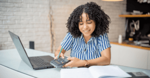 A candidate sitting in an office learning how to determine their vote goal.