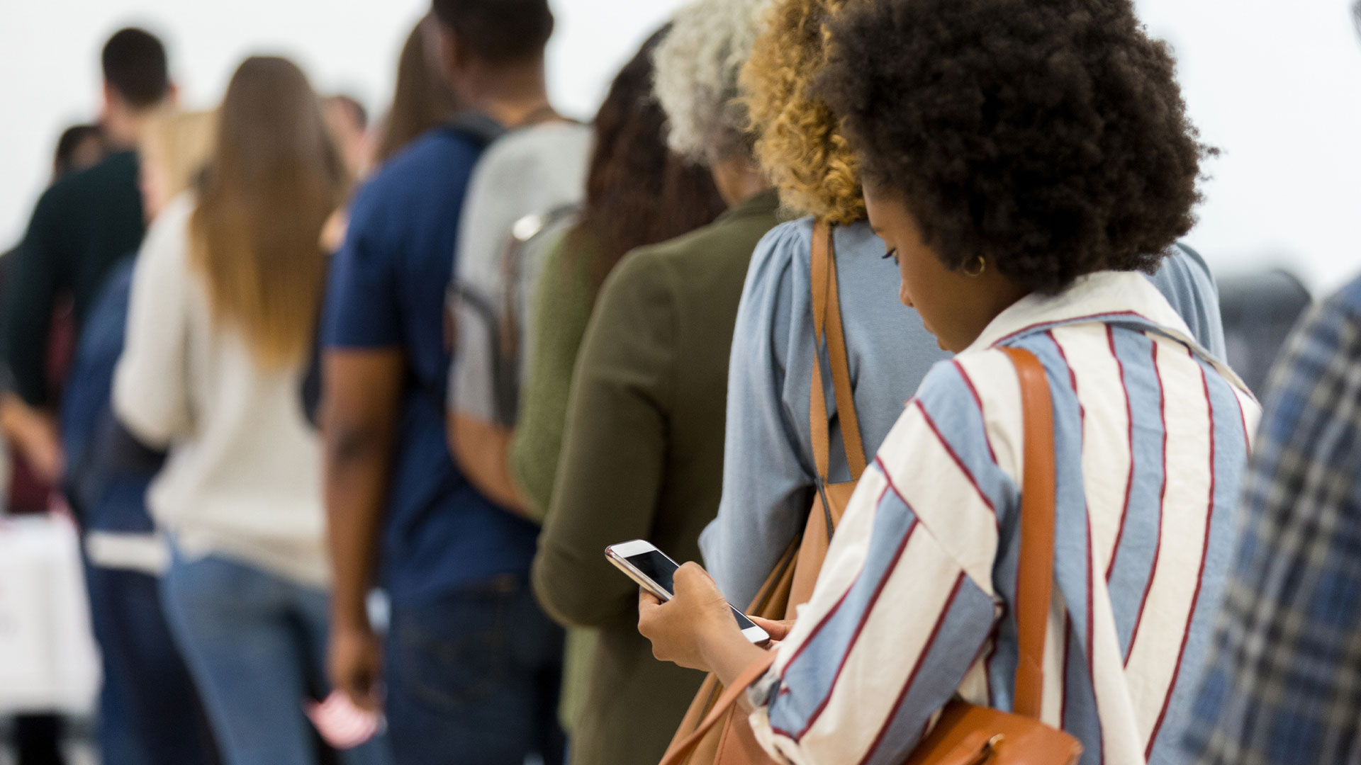 Campaign staffer calling voters during early GOTV efforts.