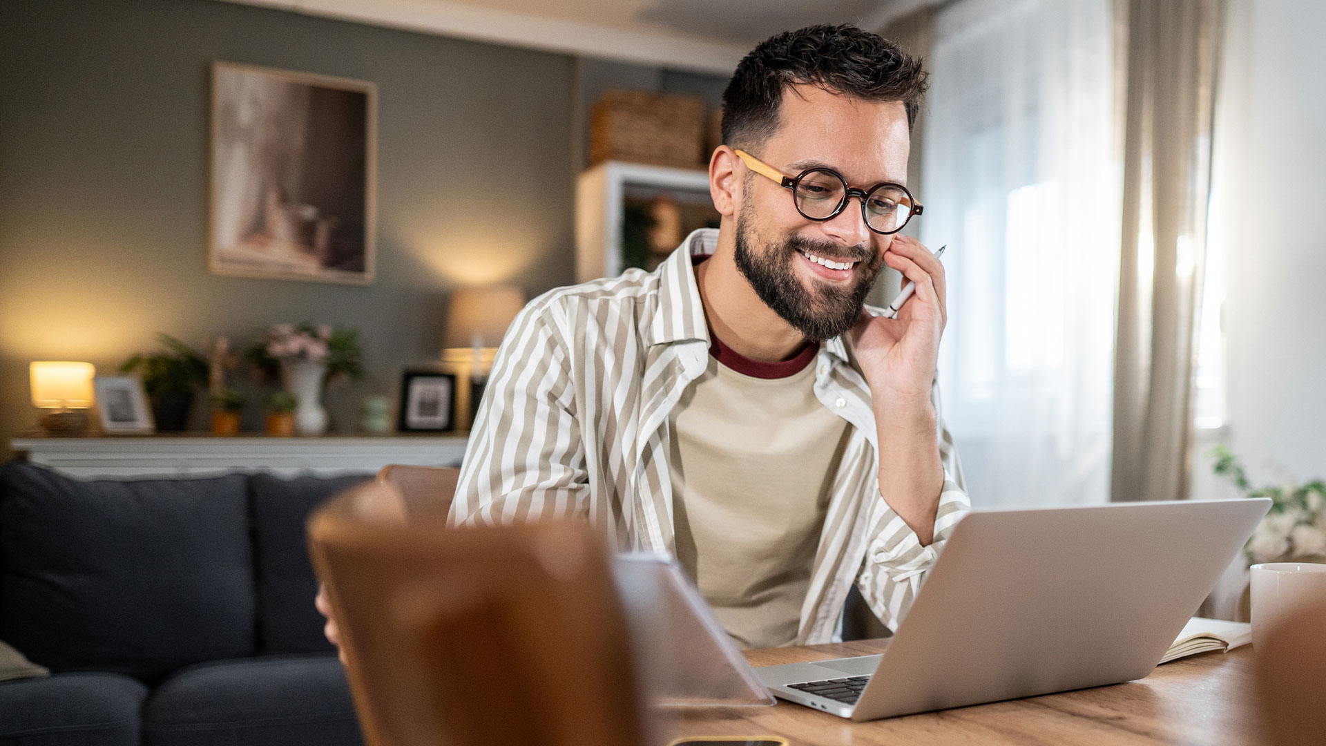 A person sitting at home setting up a phone bank with VPB Connect enabled on their laptop
